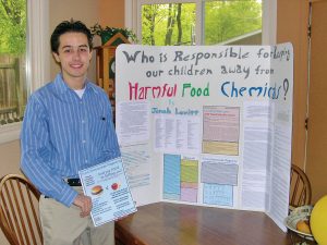 Jonah, at age 17, sharing his research on chemicals in our food.