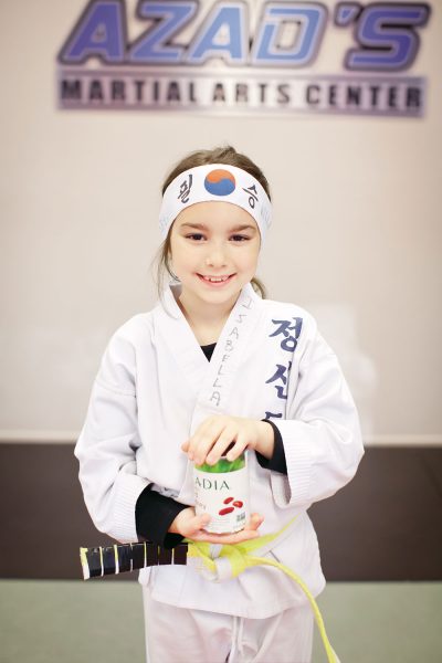 a girl at Azad’s martial arts center