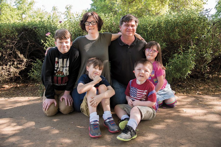 a family posed during the Holiday Season