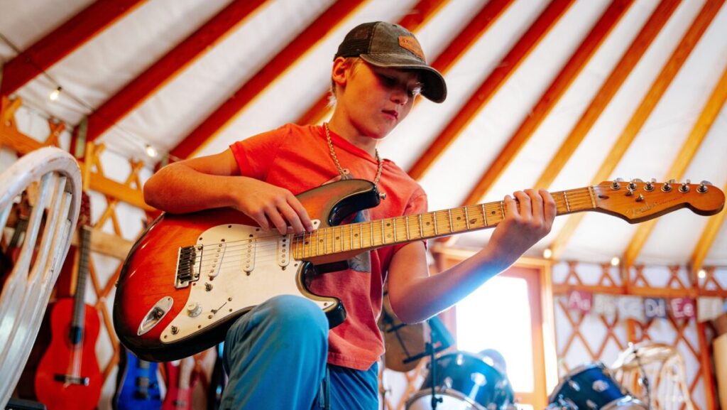Farm School students learn to sing and play a variety of instruments, understand music theory and enjoy jamming together in an ensemble. 