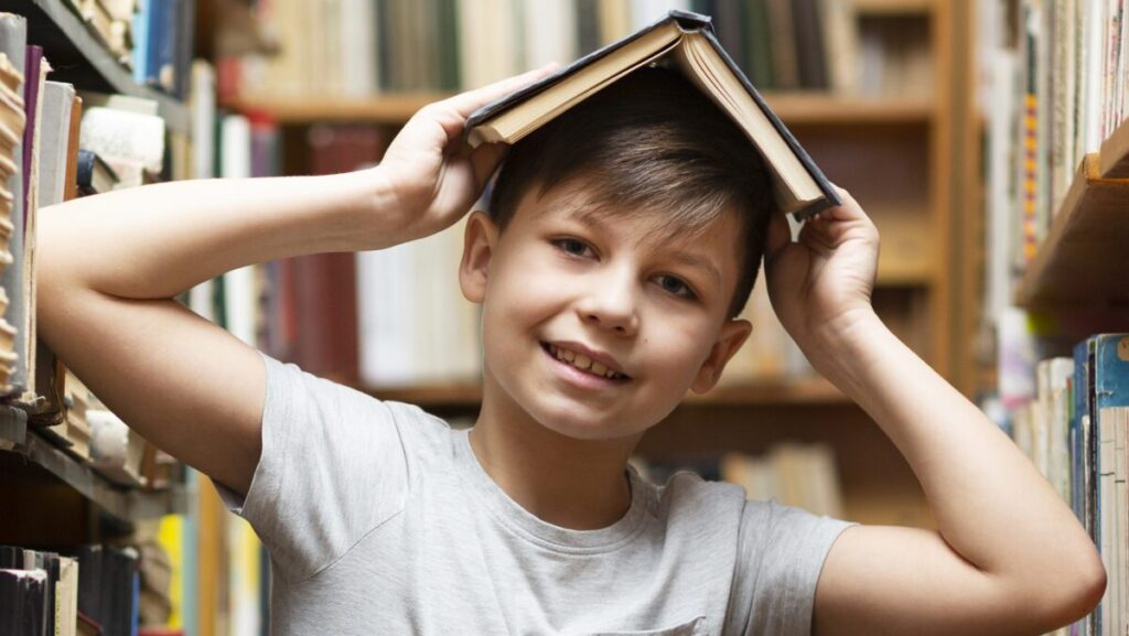 low-angle-boy-with-book-head