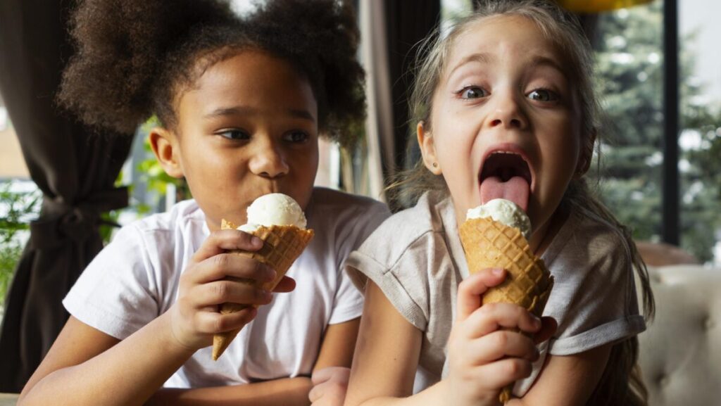 medium-shot-girls-eating-ice-cream