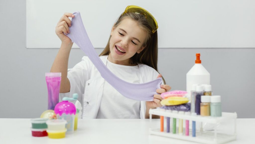 smiley-young-girl-scientist-making-slime