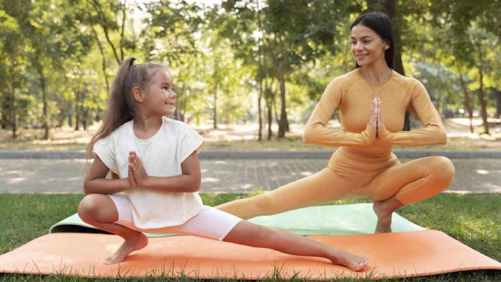 full-shot-smiley-girl-woman-doing-yoga