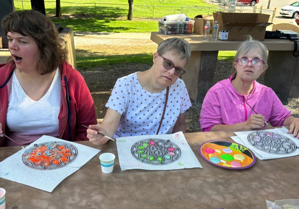 Adults with special needs enjoy camaraderie and positive social interactions through a wide variety of fun Out and About activities.  Photos provided by Out and About