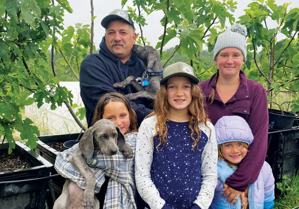 Burke family daughters Aoibheann, Cadhla and Priscilla Eibhilin, with dad David and mom Priscilla, work together to hunt for exotic figs and run Burke Family Farm and their specialty fig business. Photo by Kate Hiller.