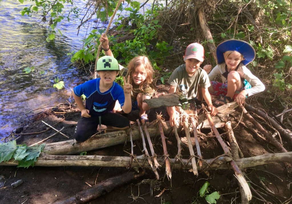 Boys and girls as young as four learn to experience the natural world through fun and challenging nature play.