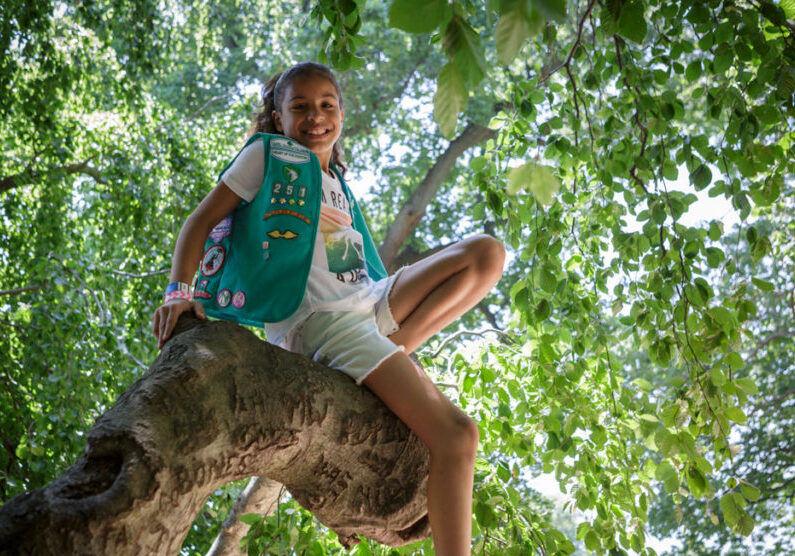 The Girl Scouts Meet Modern Challenges in a COVID-19 World- Girl Scout in a tree
