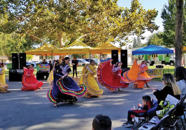 Calpuli Tonazin Ketzalcoatl, a middle school girls’ dance troop from Hamilton City, perform traditional dances from Jalisco, Mexico.