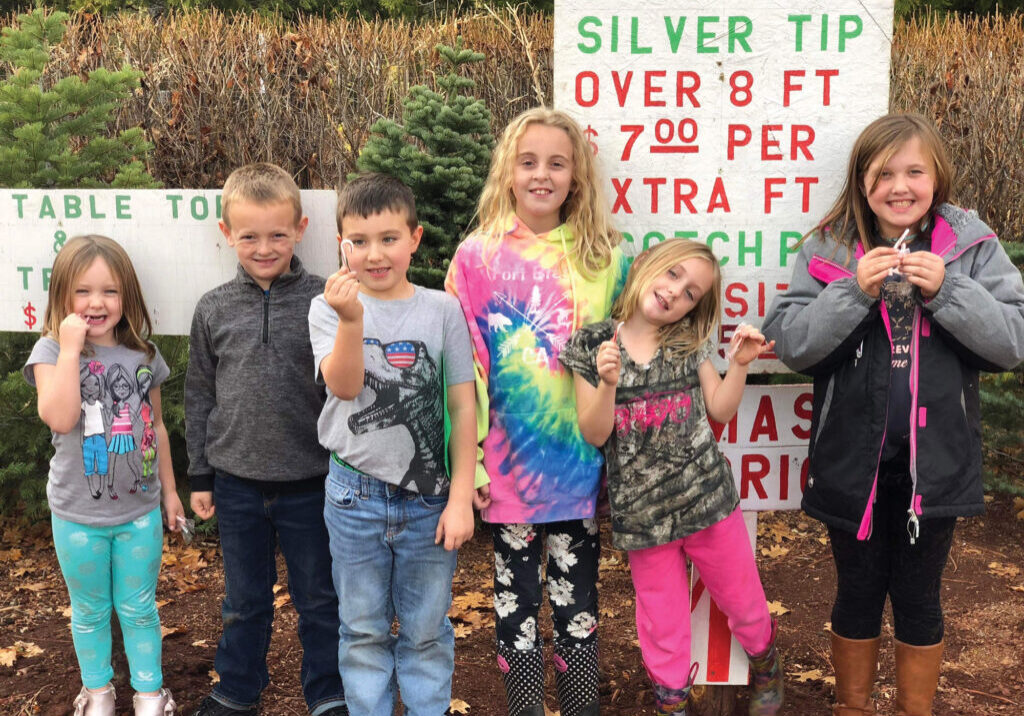 The Roger, Wolter and Muir children at the tree farm