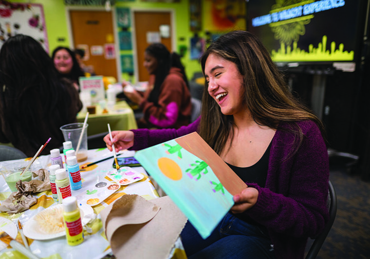 Paulina Tivas (center) and students participate in activity stations from painting, making slime, nail painting, and affirmation jars for the CCLC presents Wildcat Experience: Womxn's Edition as part of Womxn's History Month on Wednesday, March 22, 2023 in Chico, Calif.
(Jason Halley/University Photographer/Chico State)