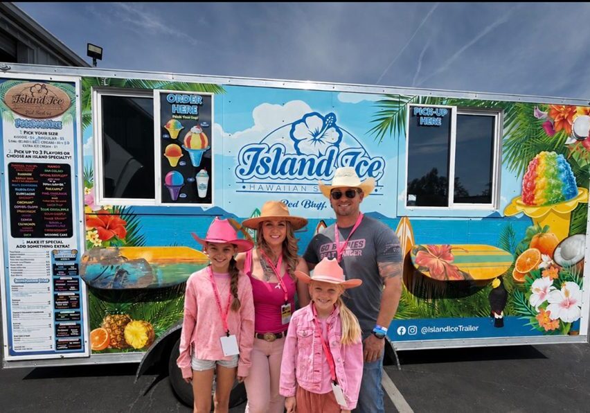 Matt and Samantha Haman enjoy teaching their children entrepreneurship by allowing them to help at Island Ice each summer.