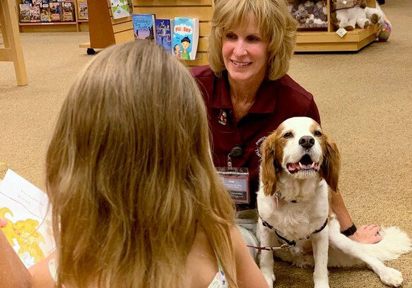 Prescription Pets and Therapy Dogs - a therapy dog with a trainer - north state parent