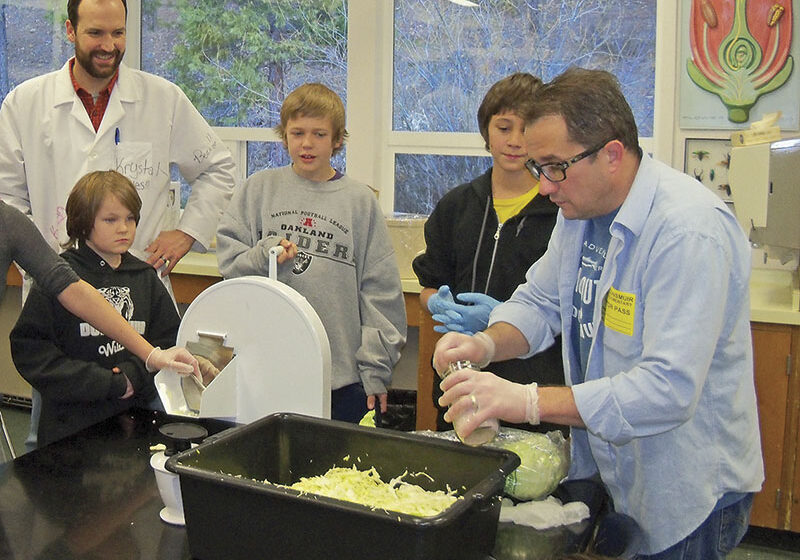 Dunsmuir Elementary School science teacher Spencer Adkisson and some of his students prepare to get hands-on with their sauerkraut-making project led by David Edmondson of Salt and Savour. 