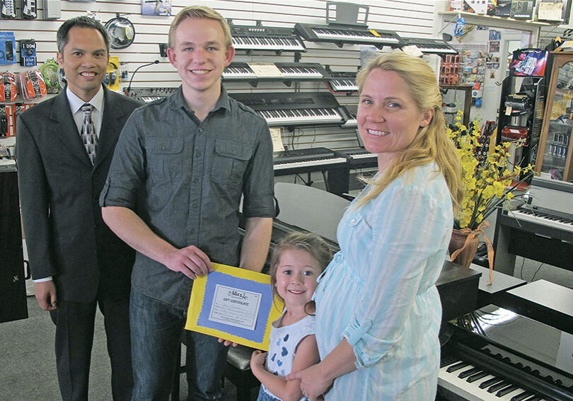 "Sean is a brilliant musician, but more importantly I believe he understands the true value of music," says Dustin Breshears (left), Sean's piano teacher. "I can't think of a more deserving student to receive this award." Also pictured with Sean are Sally Long, owner of The Music Connection, and her daughter Mary Lou.